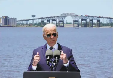  ?? Alex Brandon/Associated Press ?? President Biden, with a badly aging bridge behind him, touts his infrastruc­ture plan in Lake Charles, La.