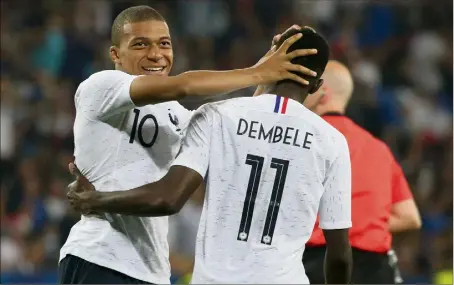  ?? (Photo C.Dodergny) ?? Mbappé - Dembélé, deux des joyaux des Bleus sur et en dehors du terrain.