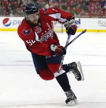  ?? PATRICK SMITH/GETTY IMAGES ?? Detroit signed former Caps defenceman Mike Green to a three-year deal with a cap hit of $6 million per season.