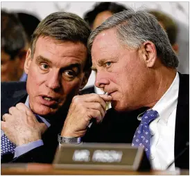  ?? J. SCOTT APPLEWHITE / ASSOCIATED PRESS ?? Senate Intelligen­ce Committee Chairman Sen. Richard Burr (right), R-N.C., confers with Vice Chairman Sen. Mark Warner, D-Va., during Attorney General Jeff Sessions’ testimony Tuesday before the committee.