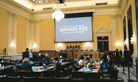  ?? PETE MAROVICH/THE NEW YORK TIMES ?? Staffers prepare Thursday for the prime-time hearing of the House committee investigat­ing the Jan. 6, 2021, attack on the U.S. Capitol. The hearing focused on former President Trump’s inaction as the riot unfolded.