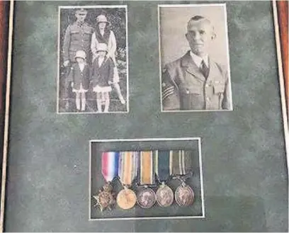  ??  ?? ■ Family photos and the medals of Sgt Thomas William Chisolm