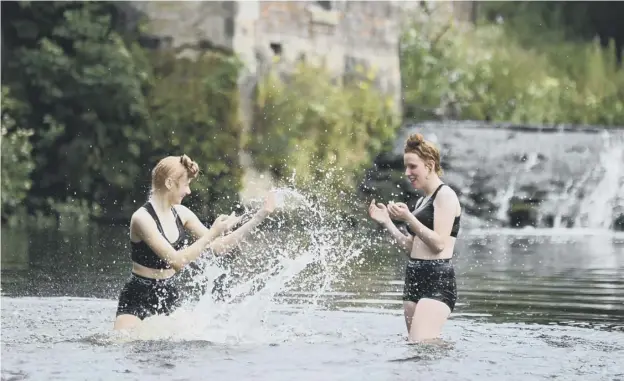  ??  ?? 0 Glasgow’s Pollok Co untry Park offered a way to cool off yesterday as the city – along with most of the UK – basked in hot sunshine