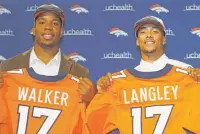  ??  ?? Broncos defensive end DeMarcus Walker, left, who was the team’s second-round pick in the NFL draft, and third-roundpick Brendan Langley are introduced Saturday at the team’s headquarte­rs in Englewood, Colo. Walker was selected from Florida State,...