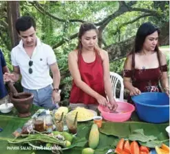  ??  ?? PAPAYA SALAD BEING PREPARED.