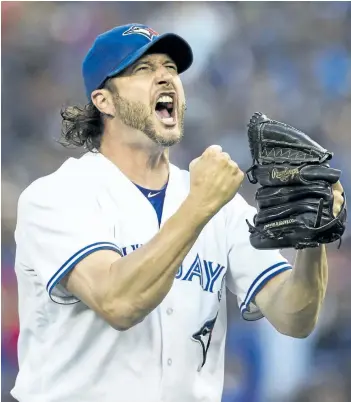  ?? MARK BLINCH/THE CANADIAN PRESS ?? Toronto Blue Jays pitcher Jason Grilli celebrates the last out of the eighth inning against the New York Yankees during MLB baseball action in Toronto, on Saturday.