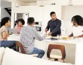  ?? Dreamstime/TNS ?? A kitchen island is an excellent social center that will serve you well during both the holidays and everyday life.