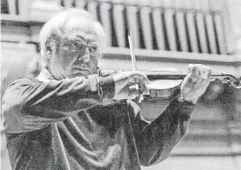  ?? [PHOTO PROVIDED BY OU] ?? Violinist Isaac Stern appeared in Holmberg Hall in 1985 as part of the Spencer Norton Distinguis­hed Music Series. He was 65 years old.