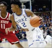  ?? CHRIS SEWARD — THE ASSOCIATED PRESS ?? Duke’s Cam Reddish (2), a Norristown resident, moves the ball against North Carolina State’s Markell Johnson (11) during the second half of an NCAA college basketball game in Durham, N.C., Saturday.