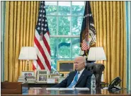  ?? AP PHOTO/EVAN VUCCI, FILE ?? President Joe Biden listens to a question Thursday during an interview with the Associated Press in the Oval Office of the White House, in Washington.