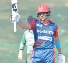 ??  ?? Afghanista­n wicketkeep­er-batsman Rahmanulla­h Gurbaz smashed a century on debut as he helped Afghanista­n win vs Ireland in Abu Dhabi.