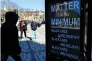  ??  ?? A sign in Evanston reads ‘Matter is the minimum’. Photograph: Shafkat Anowar/AP