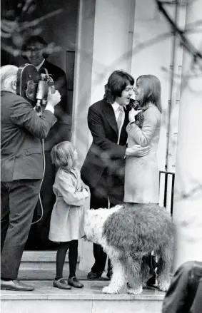  ??  ?? MY SWEET LORD [ ABOVE LEFT ] George in London with members of the Radha Krishna Temple in 1969, the year he began recording with them.