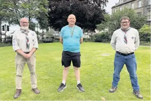  ??  ?? Good cause Peter, centre, with Peter Hamilton, left, scout leader for 57th Perthshire Cubs and Scouts, and assistant scout leader Tony Douglas