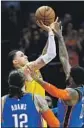  ?? Sue Ogrocki Associated Press ?? KYLE KUZMA made seven three-point shots and scored 32 points.