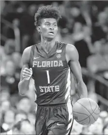  ?? Michael Hickey Getty Images ?? JONATHAN ISAAC of Florida State has the most upside of any player in the draft, according to some scouts.