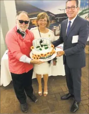  ?? Contribute­d / ?? From left, Sky Mercede of Forever Sweet Bakery, who provided the cake, attends the groundbrea­king at Veterans Park in Stamford with Patricia Parry and Gov. Dannel P. Malloy.