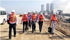  ??  ?? Officials at the Port City site