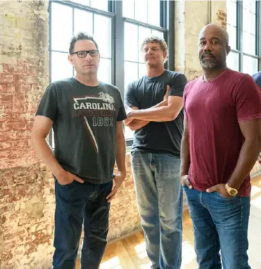  ??  ?? Hootie & the Blowfish: Dean Felber, left, Mark Bryan, Darius Rucker and Jim Sonefeld.