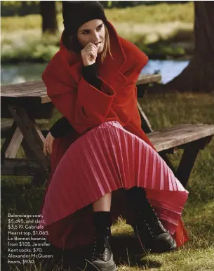  ??  ?? Balenciaga coat, $5,495, and skirt, $3,519. Gabriela Hearst top, $1,065. Le Bonnet beanie, from $105. Jennifer Kent socks, $70. Alexander McQueen boots, $930.