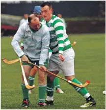  ?? Photo: Kevin McGlynn ?? John MacCormick battles with Andrew MacDonald during the match which the youngsters won 4-3.