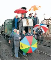  ??  ?? Left: Staff at Bridgnorth locomotive works launching the Home & Dry appeal. LESLEY CARR
