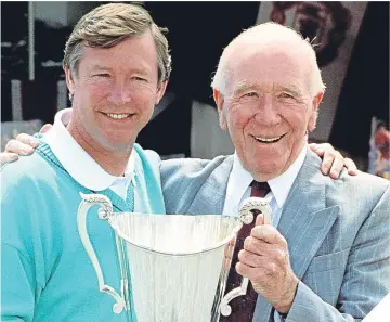  ??  ?? ■
Scottish footballin­g knights, Sir Alex Ferguson and Sir Matt Busby.