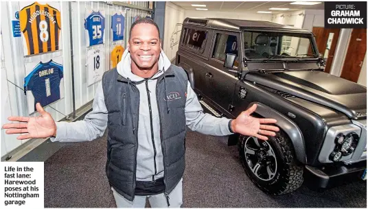  ??  ?? Life in the fast lane: Harewood poses at his Nottingham garage