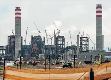  ?? /Sunday Times ?? White elephant: Eskom’s Kusile power station project in Mpumalanga. A study has found that avoiding the completion of Kusile units 5 and 6 could result in a net financial saving of R15bn to R17bn.