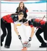  ?? AP PHOTO/NATACHA PISARENKO ?? Canada’s skip Rachel Homan, center, watches teammates Lisa Weagle, left, and Joanne Courtney sweep the ice during a women’s curling match against China at the 2018 Winter Olympics in Gangneung, South Korea, Tuesday.