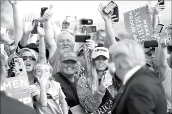  ?? (Jonathan Ernst, Reuters) ?? US President Donald Trump attends a campaign rally at Middle Georgia Regional Airport in Macon, Georgia, US Sunday.