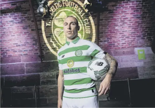  ??  ?? 0 Scott Brown models next season’s Celtic kit at an event at the Arches in Glasgow last night where he defended his recent behaviour.