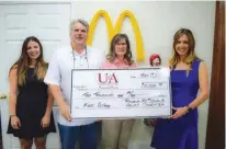  ?? Submitted photo ?? Shown, from left, are Anna Powell, University of Arkansas at Hope-Texarkana Kids’ College director; Steve Montgomery and Celia Montgomery of McDonald’s; and Jill Bobo, executive director of the UAHT Foundation. Ronald McDonald Children’s Charity...