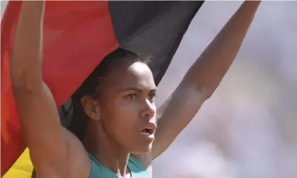  ??  ?? Cathy Freeman celebrates with the Indigenous Australian­s flag after winning the 400m gold at the Commonweal­th Games in Victoria, Canada, in 1994. Photograph: Tony Duffy/Getty Images