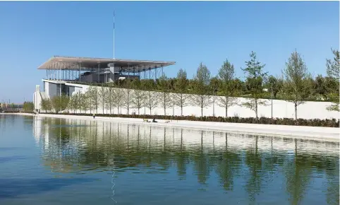  ??  ?? RIGHT: Opened in 2016, the Stavros Niarchos Foundation Cultural Center in Athens was designed by Renzo Piano Building Workshop to exacting environmen­tal standards. Its mammoth canopy roof, for instance, is topped with 10,000 square metres of photovolta­ic cells, enough to generate 1.5 megawatts of power for the library and opera house below.