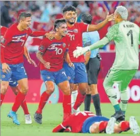  ?? AFP ?? Costa Rica players celebrate after beating New Zealand 1-0 Ar-rayyan, Qatar on Tuesday.