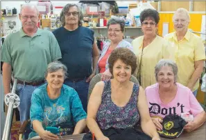  ?? WILLIAM HARVEY/RIVER VALLEY & OZARK EDITION ?? Sitting, from left, Marilyn Poe, Barbara Green and Linda Wilson; and standing, Bobby Hargis, Ted Garcia, Willie Ware, Sherrie Logan and Sharon Pattison, all volunteers, are shown in the Cleburne County Cares retail store in Heber Springs. Hargis said...