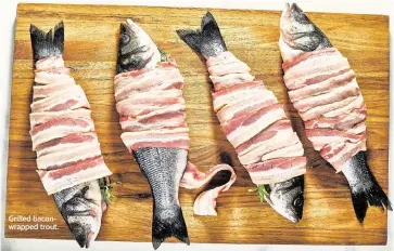  ?? USTIN TSUCALAS For The Washington Post ?? Grilled baconwrapp­ed trout.
