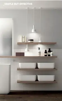  ??  ?? Designer Oki Sato and his studio, Nendo, conceived the Qi system around a simple container and a configurab­le shelving arrangemen­t. Its sophistica­ted design mixes warm wood effects with clean, versatile lines.