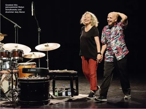  ??  ?? Greatest hits: percussion­ist Robyn Schulkowsk­y and drummer Joey Baron