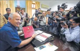  ?? SONU MEHTA/HT ?? Delhi finance minister Manish Sisodia before presenting the annual budget on Thursday.