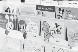  ?? LOS ANGELES TIMES FILE PHOTO ?? A selection of greeting cards are displayed at a Hallmark store in Macys.