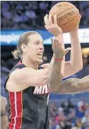  ?? JOHN RAOUX/AP ?? Center Kelly Olynyk made his preseason debut for the Heat on Thursday night.