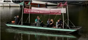  ?? AP ?? A punt named PET Project, which is made from 99% recycled single-use plastic, floats on the River Thames in Richmond, south west London. Made from ‘Plaswood’, a recycled plastic material that is used as a substitute for wood, PET Project will be used to raise awareness of plastic pollution in waterways and oceans and to educate local schoolchil­dren by offering plastic waste fishing trips. —