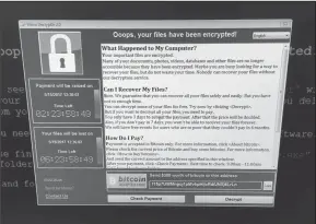  ?? Associated Press ?? Cyber attack:This image provided by the Twitter page of @fendifille shows a computer at Greater Preston CCG as Britain's National Health Service is investigat­ing "an issue with IT" on Friday. Several British hospitals say they are having major computer...