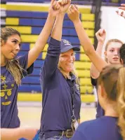  ?? GABRIELA CAMPOS/NEW MEXICAN FILE PHOTO ?? Santa Fe High coach Josie Adams works with her team in 2018. The Demonettes have been able to squeeze 27 players and three coaches onto the floor during 90-minute blocks.