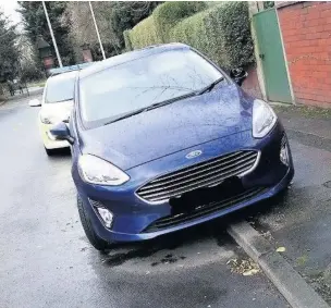  ??  ?? The blue Fiesta police have recovered, which is believed to have been used by an armed gang