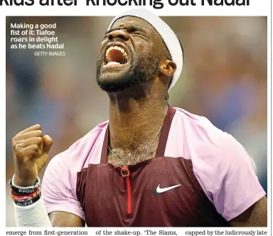  ?? GETTY IMAGES ?? Making a good fist of it: Tiafoe roars in delight as he beats Nadal