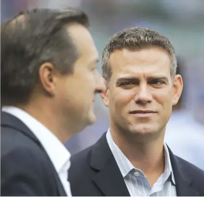  ?? | CHARLES REX ARBOGAST/ AP ?? Theo Epstein’s deal comes with the Cubs wrapping up one of the greatest seasons in franchise history.