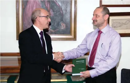  ??  ?? Kevin J. Ellul, Director Library Services (left) and Godfrey Baldacchin­o (right)